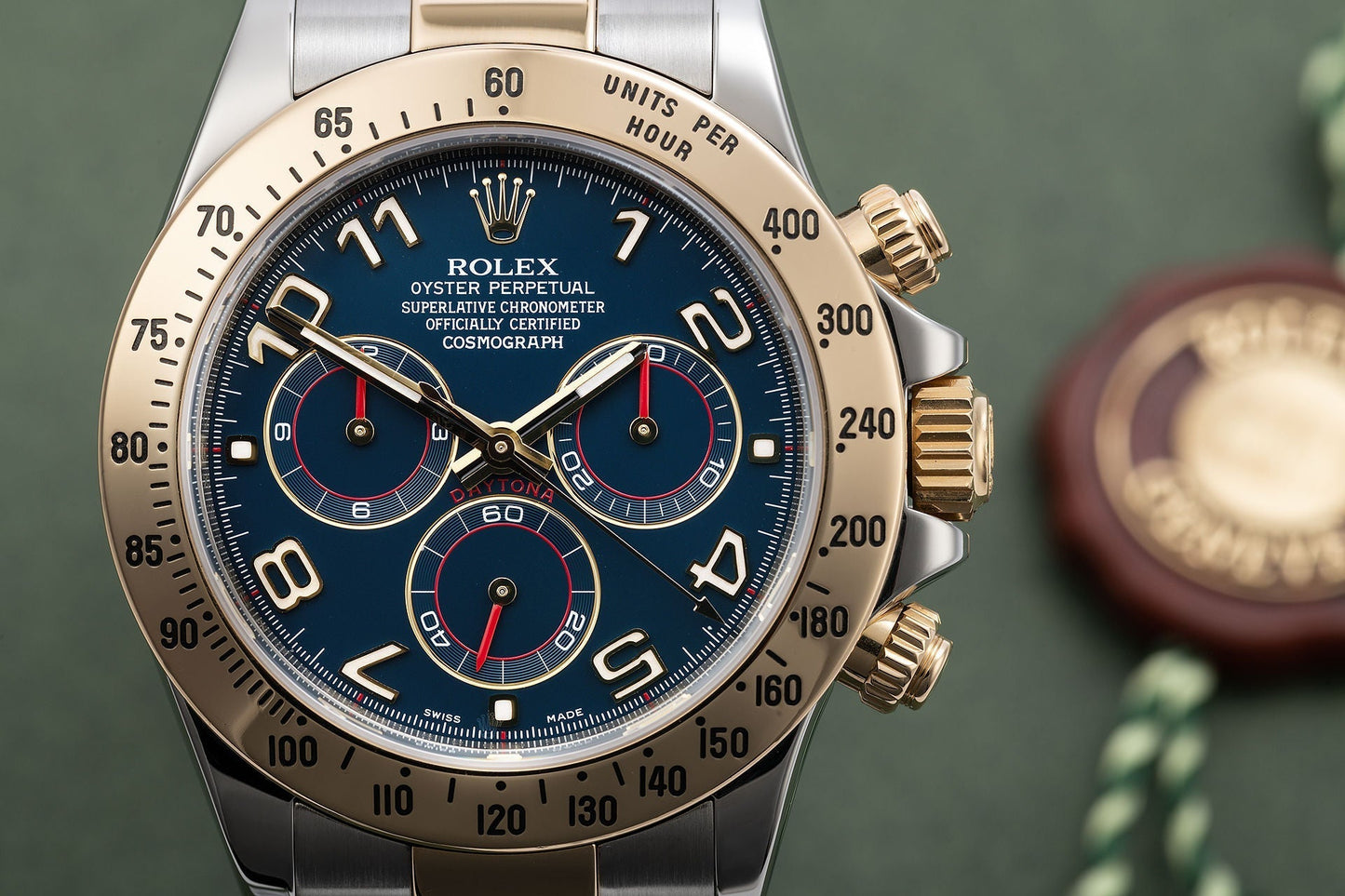 Daytona Steel Yellow Gold Blue Racing Dial Mens Watch 116523